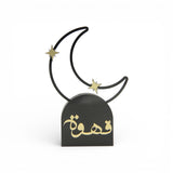 هلال مع نجوم وعبارة «قهوة»