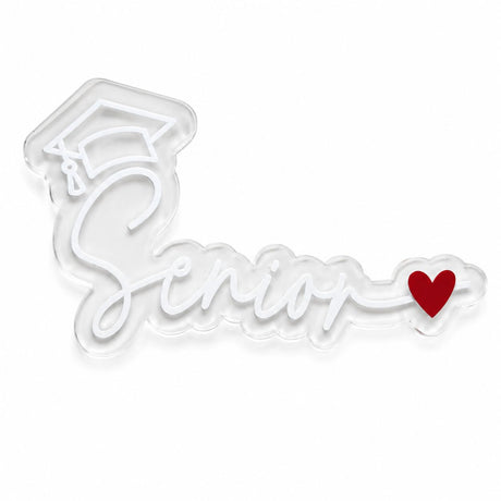 Clear acrylic Senior graduation sign with white acrylic script, graduation cap, and red heart.