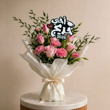 Luxury graduation bouquet with acrylic topper reading "اخي احلى خريج" for celebrating brother graduation in UAE