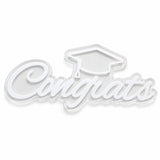 Clear acrylic Congrats graduation sign with white acrylic lettering and graduation cap design