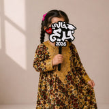 black acrylic graduation prop with Arabic text khali ahla khareej 2026 by Hams